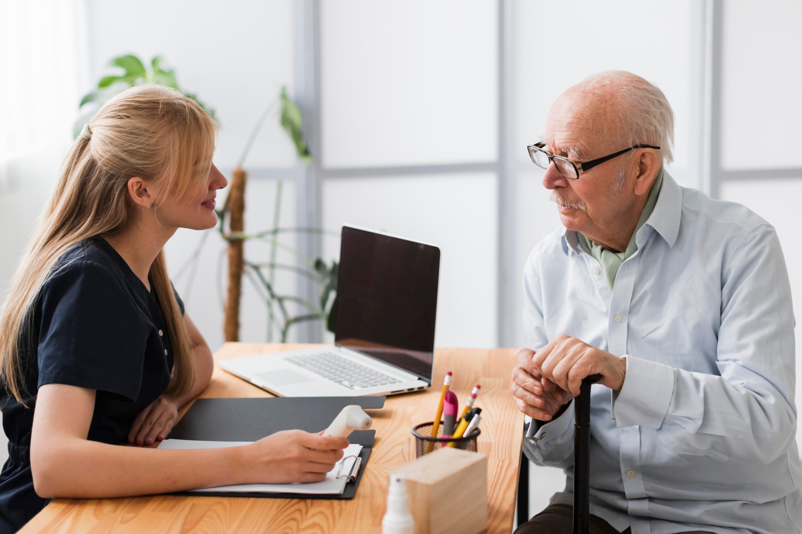 senior-man-having-check-up-with-nurse-adult-day-care-nyc