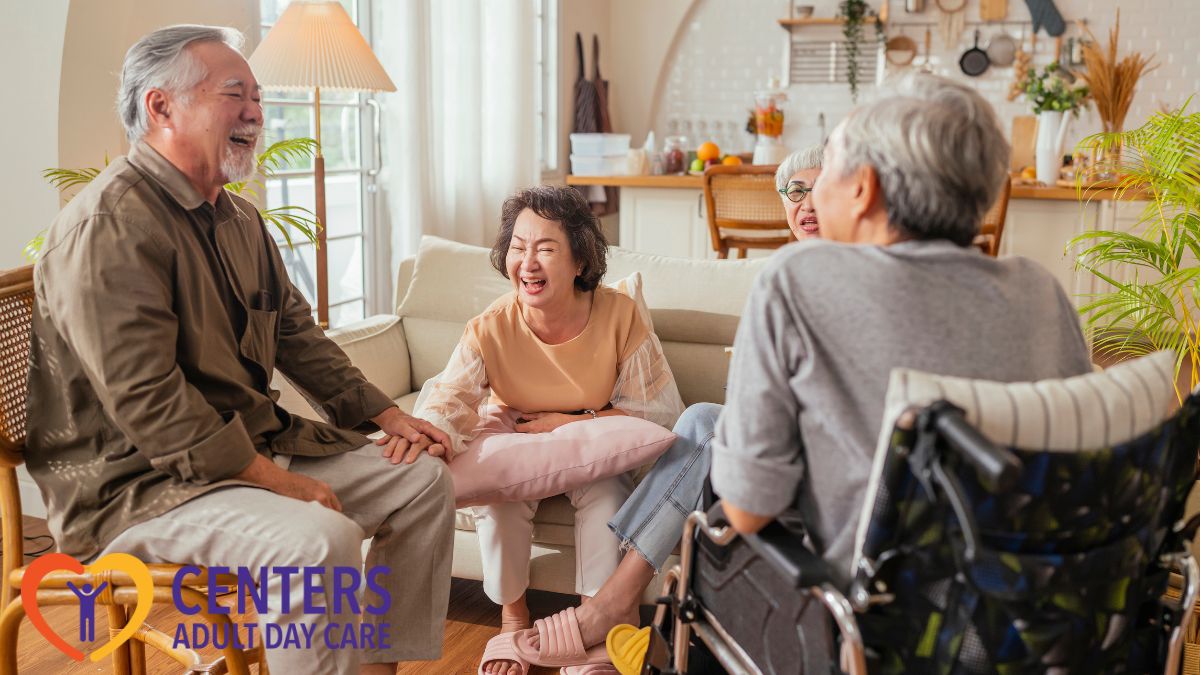 A group of seniors laugh and enjoy a harmonious bonding moment in a well-lit room, illustrating adult day care services.