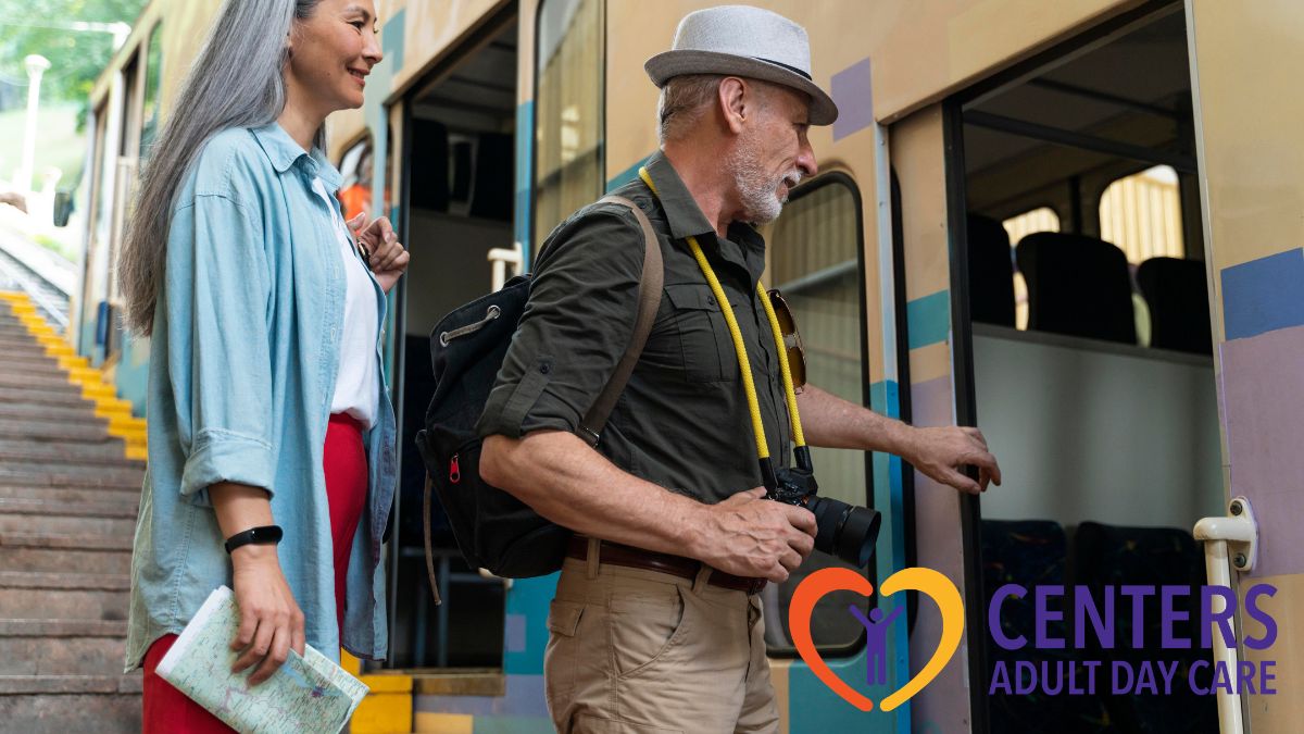 A senior man and woman board a bus together, receiving priority seating as part of accessible transportation services for seniors.